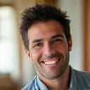 Portrait of a cheerful parent, David Rodriguez, looking energetic and calm.